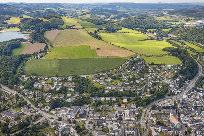 Aerial view, town view, Meschede, planned building area near Langelohweg, Sauerland, Hochsauerlandkreis, North Rhine-Westphalia, Germany, building area, mountains and valleys, city, DE, Europe, radio tower, property tax, hilly landscape, real estate, aerial view, aerial photography, aerial photography, Schröershof holiday home rental, townscape, urban area, overview, bird's eye view, wooded area, meadows and fields, residential area, living and life, residential area, quality of life, bird's eye view, overview