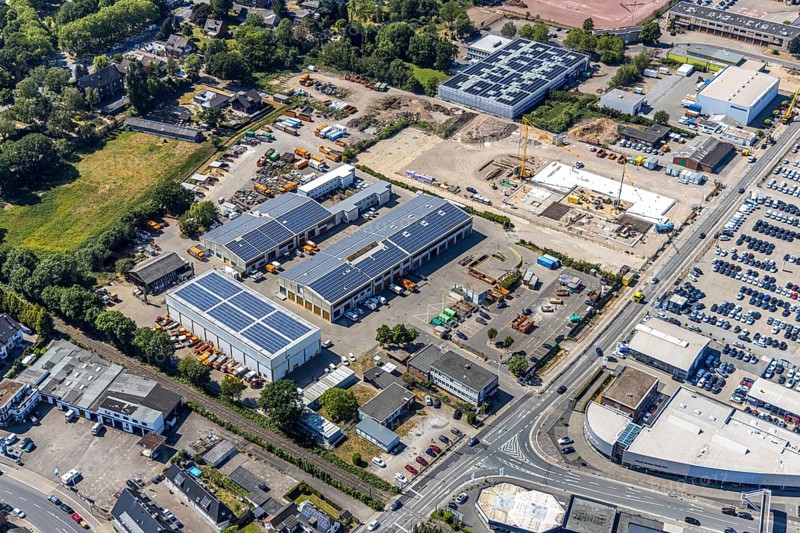 Aerial view, construction site ENNI factory and administration building, former carpenter's workshop Cleve, recycling centre, building with solar roofs, Mörs, Ruhr area, North Rhine-Westphalia, Germany, DE, Europe, birds-eyes, view, aerial photograph, aerial photography, aerial photography, overview, bird's eye view, administration building