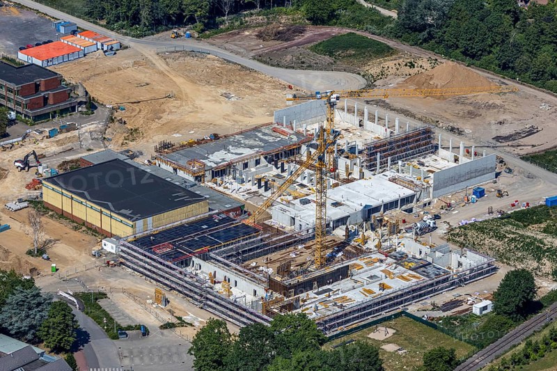 Aerial view, Berufskolleg für Technik Mörs, construction site of new school building, Berufskolleg-Campus, joint campus of the Berufskolleg für Technik, the Hermann-Gmeiner-Berufskolleg, the Mercator-Berufskolleg and the Fachseminar für Altenpflege, Mörs, Ruhr area, North Rhine-Westphalia, Germany, DE, Europe, birds-eyes, view, aerial photograph, aerial photography, aerial photography, overview, overview, bird's-eye view, vocational school, training, profession, apprenticeship, technical school