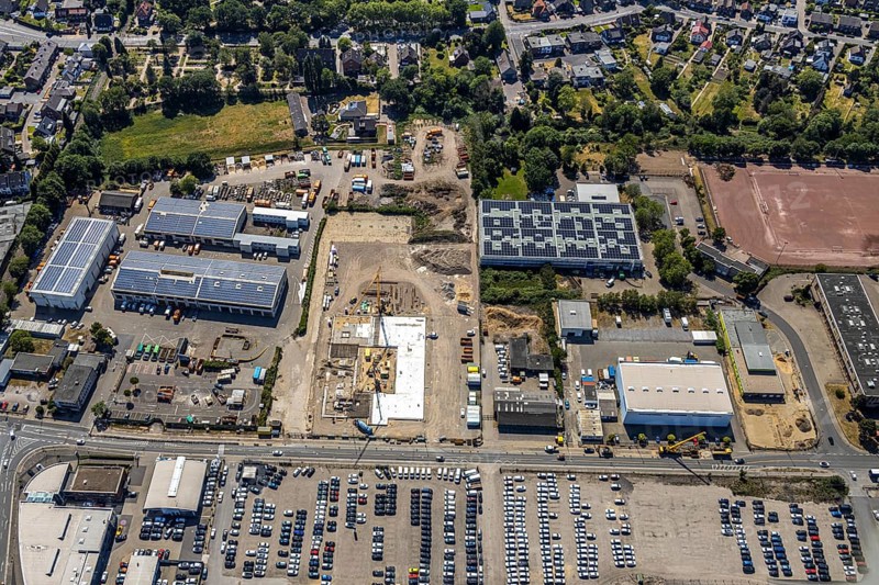 Aerial view, construction site ENNI factory and administration building, former carpenter's workshop Cleve, recycling centre, building with solar roofs, Mörs, Ruhr area, North Rhine-Westphalia, Germany, DE, Europe, birds-eyes, view, aerial photograph, aerial photography, aerial photography, overview, bird's eye view, administration building