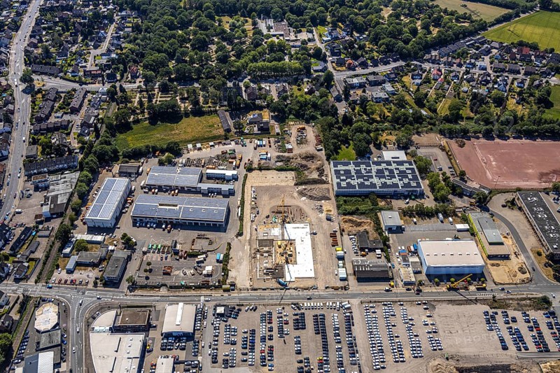 Aerial view, construction site ENNI factory and administration building, former carpenter's workshop Cleve, recycling centre, building with solar roofs, Mörs, Ruhr area, North Rhine-Westphalia, Germany, DE, Europe, birds-eyes, view, aerial photograph, aerial photography, aerial photography, overview, bird's eye view, administration building