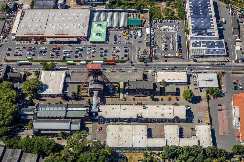 Aerial view, Former Rheinpreußen colliery, Franz-Haniel-Straße industrial estate, Hornbach DIY store, REAL supermarket, Mörs, Ruhr area, North Rhine-Westphalia, Germany, DE, Europe, birds-eyes, view, aerial photograph, aerial photography, aerial photography, overview, overview, bird's eye view, colliery, DIY store, hobby, construction, garden, construction supplies, tools, machines, industry, trade, business, commercial enterprise, production, trade, shopping, food