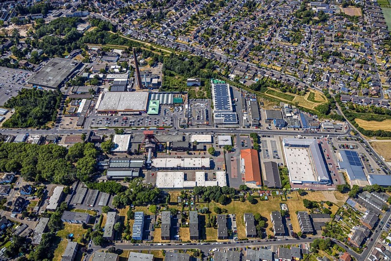 Aerial view, Former Rheinpreußen colliery, Franz-Haniel-Straße industrial estate, Hornbach DIY store, REAL supermarket, Mörs, Ruhr area, North Rhine-Westphalia, Germany, DE, Europe, birds-eyes, view, aerial photograph, aerial photography, aerial photography, overview, overview, bird's eye view, colliery, DIY store, hobby, construction, garden, construction supplies, tools, machines, industry, trade, business, commercial enterprise, production, trade, shopping, food