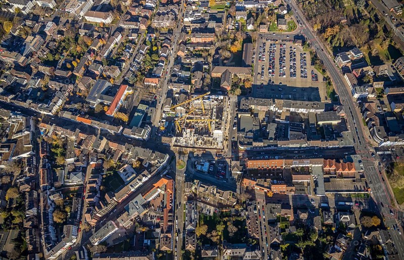 Aerial view, construction site new building Homberger Höfe, flats and commercial areas, formerly Horten, Augustastraße to Klever Straße, Mörs, Ruhr area, North Rhine-Westphalia, Germany, construction work, construction, construction area, building site, building plots, construction crane, construction measure, construction project, construction site, DE, Europe, Friedrich-Ebert-Platz, commercial buildings, property tax, Homberger Straße, real estate, Knappschaft health insurance agency, aerial view, aerial photography, aerial photography, new building, car parks, overview, bird's-eye view, residential complex, living and life, residential area, residential buildings, birds-eyes view, overview