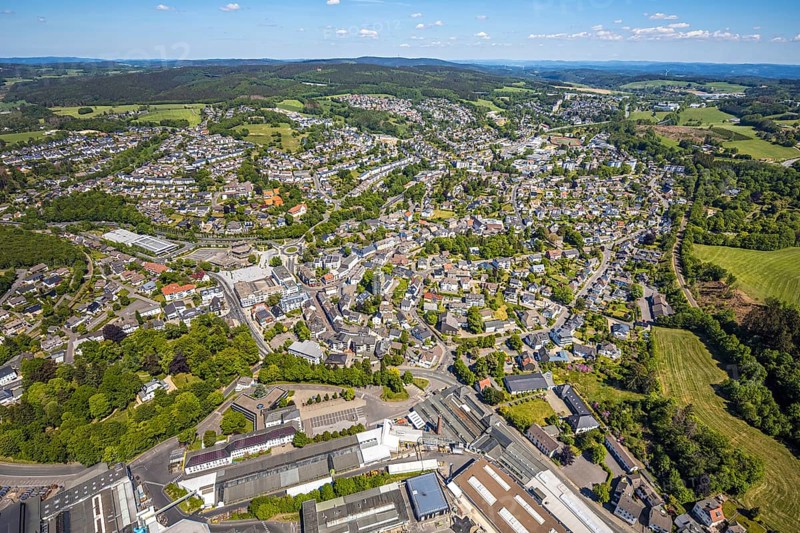 Aerial view, town view, town hall, construction site renovation Jesus-Christus-Kirche, Meinerzhagen, Märkischer Kreis, Sauerland, North Rhine-Westphalia, Germany, place of worship, construction work, construction project, city, DE, Europe, distant view, religious community, place of worship, hilly landscape, city centre, church, parish, denomination, roundabout, culture, art, aerial view, aerial photography, aerial photography, renovation, redevelopment, townscape, city area, city centre, overview, events, event location, event venue, event centre, bird's-eye view, residential area, birds-eyes view, cultural use, overview