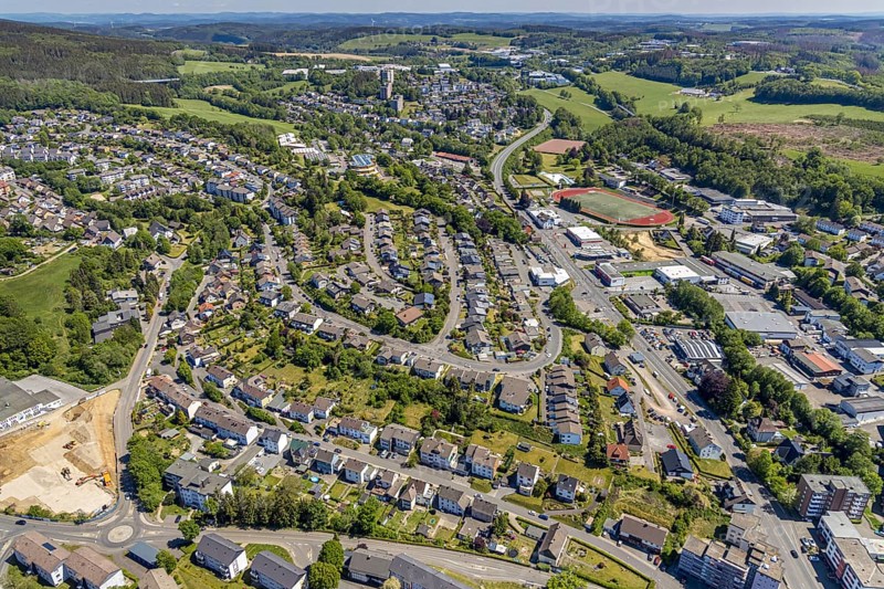 Aerial view, stadium, commercial area Oststraße, residential area Zum Rothenstein, school centre Rothenstein, Meinerzhagen, Märkischer Kreis, Sauerland, North Rhine-Westphalia, Germany, education, educational institution, DE, Europe, primary school Am Kohlberg, property tax, real estate, educational institute, aerial photograph, aerial photography, aerial photography, school, overview, bird's eye view, residential area, living and life, residential area, residential buildings, residential quality, housing estate, birds-eyes view, overview