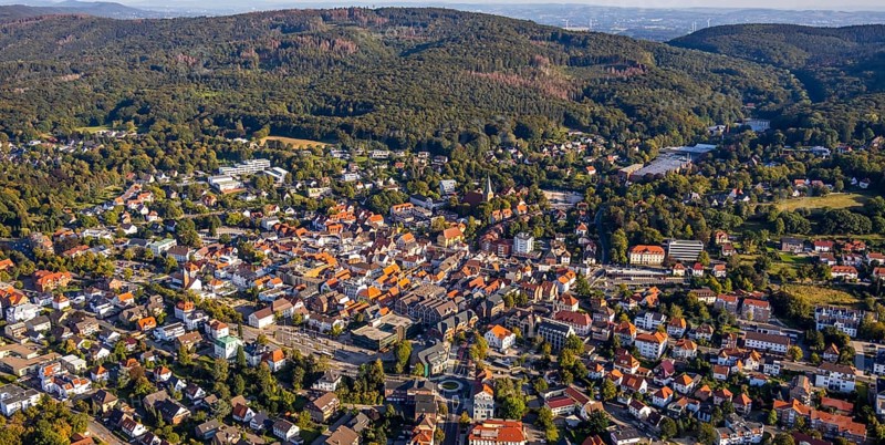 Aerial view, Wiehengebirge, local view, evang.luth. St. Andreas-Kirche, Lübbecke, Ostwestfalen-Lippe, OWL, North Rhine-Westphalia, Germany, place of worship, education, educational institution, DE, Europe, religious community, place of worship, property tax, grammar school, holy place, real estate, church, church community, denomination, educational institute, aerial photograph, aerial photography, aerial photography, OWL-Buch, OWL-Buch, East Westphalia, Privatbrauerei Ernst Barre GmbH, religion, religious site, school, Städt. Wittekind Gymnasium, overview, bird's-eye view, housing estate, housing and living, residential area, residential buildings, residential quality, residential neighbourhood, housing estate, birds-eyes view, overview, red roofs