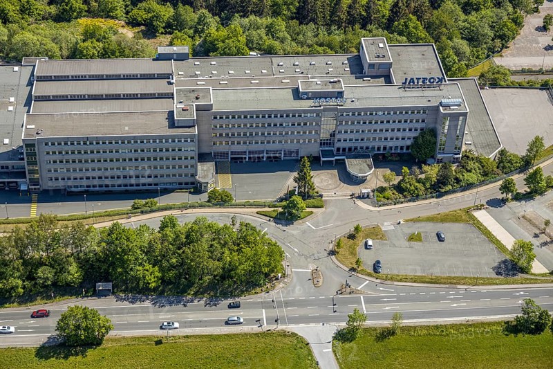 Aerial photograph, Leopold Kostal GmbH & Co. KG, An der Bellmerei, Lüdenscheid, Märkischer Kreis, Sauerland, North Rhine-Westphalia, Germany, DE, Europe, commercial area, commercial use, industrial plants, industrial area, industrial site, Kostal, aerial view, aerial photography, aerial photography, car parks, production plants, production halls, overview, traffic, bird's-eye view, forest area, birds-eyes view, overview
