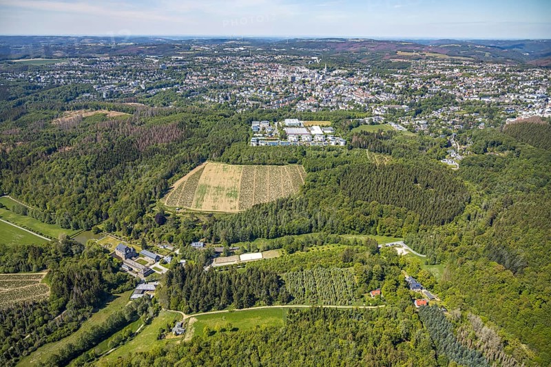 Aerial view, Neuenhof Castle, castle garden, Elspetal, Lüdenscheid, Märkischer Kreis, Sauerland, North Rhine-Westphalia, Germany, architectural monument, castle courtyard, DE, Europe, manor house, manor building, courtyard complex, hilly landscape, aerial photograph, aerial photography, aerial photography, Neuenhofer Straße, castle, castle complex, castle park, overview, bird's-eye view, wooded area, moated castle, moated castle, bird's-eye view, overview