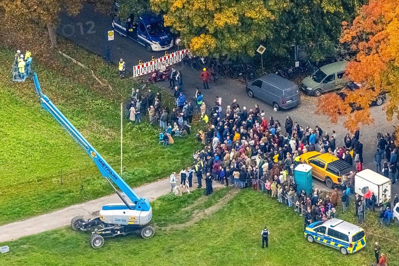 Aerial photo, thousands of spectators watched with great interest as the Gersteinwerk chimney was blown up half an hour late. The 282 metre high RWE chimney fell exactly into the prepared gravel bed. City limits of Werne, Hamm North Rhine-Westphalia, Germany
