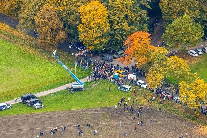 Aerial photo, thousands of spectators watched with great interest as the Gersteinwerk chimney was blown up half an hour late. The 282 metre high RWE chimney fell exactly into the prepared gravel bed. City limits of Werne, Hamm North Rhine-Westphalia, Germany
