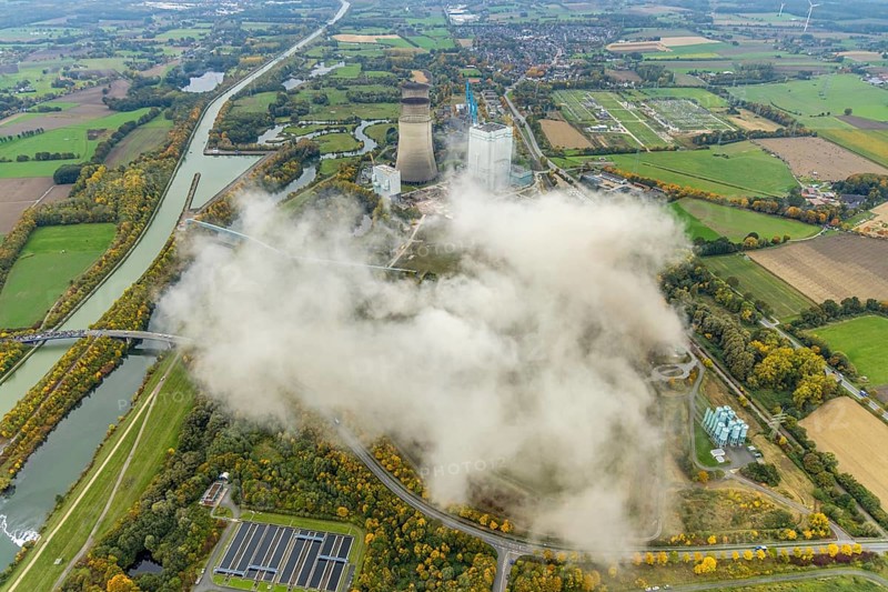 Aerial photo, thousands of spectators watched with great interest as the Gersteinwerk chimney was blown up half an hour late. The 282 metre high RWE chimney fell exactly into the prepared gravel bed. City limits of Werne, Hamm North Rhine-Westphalia, Germany