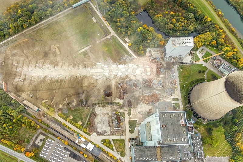 Aerial photo, thousands of spectators watched with great interest as the Gersteinwerk chimney was blown up half an hour late. The 282 metre high RWE chimney fell exactly into the prepared gravel bed. City limits of Werne, Hamm North Rhine-Westphalia, Germany