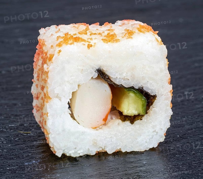 Sushi dish on dark grey stone surface