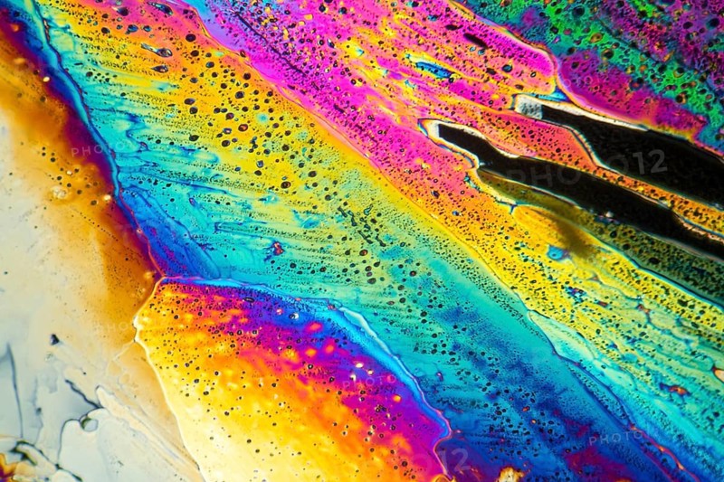 Colorful microscopic shot of Sodium acetate micro crystals in polarized light