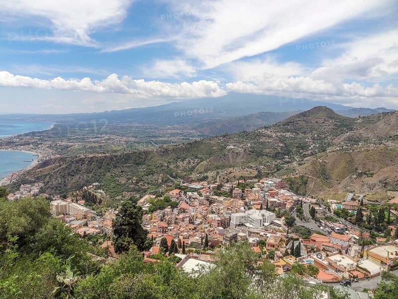 Distant aerial view of Taormina, a comune in Sicily, Italy