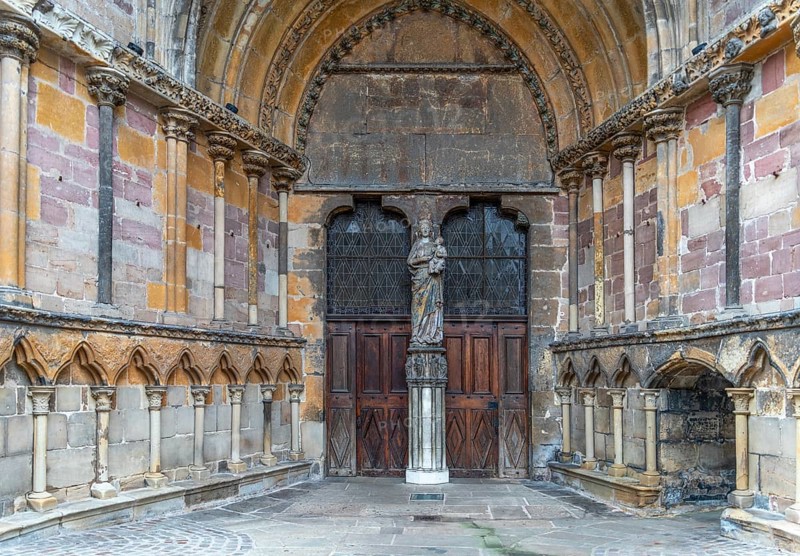 Entrance of the Basilica of Saint Maurice in Epinal, a commune in northeastern France and the prefecture of the Vosges department at winter time