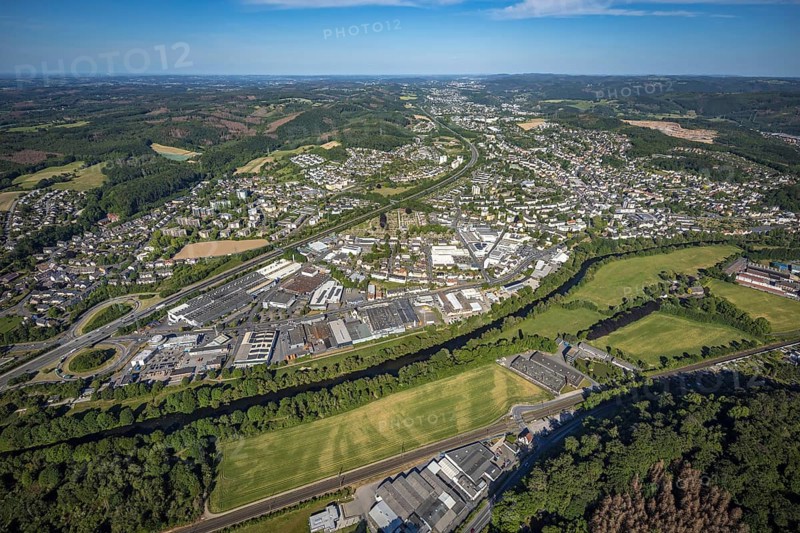 Aerial view, motorway A46, city centre view and commercial area Elseyer Straße, river Lenne, Hagen-Hohenlimburg, Ruhr area, North Rhine-Westphalia, Germany, DE, Europe, distant view, commercial enterprises, commercial area, commercial area, commercial location, commercial use, property tax, real estate, industrial area, industrial location, aerial view, aerial photography, aerial photography, overview, bird's-eye view, forest area, living and working, living and life, residential area, residential buildings, residential quality, housing estate, birds-eyes view, overview