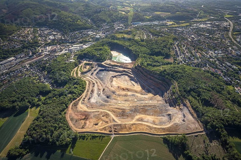 Aerial photograph, Steltenberg quarry, Hohenlimburg lime works, Hagen-Hohenlimburg, Ruhr area, North Rhine-Westphalia, Germany, DE, Europe, protected landscape Steltenberg quarry, Hohenlimburg lime works GmbH, hilly landscape, Steltenberg landscape conservation area, aerial photograph, aerial photography, aerial photography, quarry, open-cast mine, overview, bird's-eye view, overview, thyssenkrupp Hohenlimburg GmbH