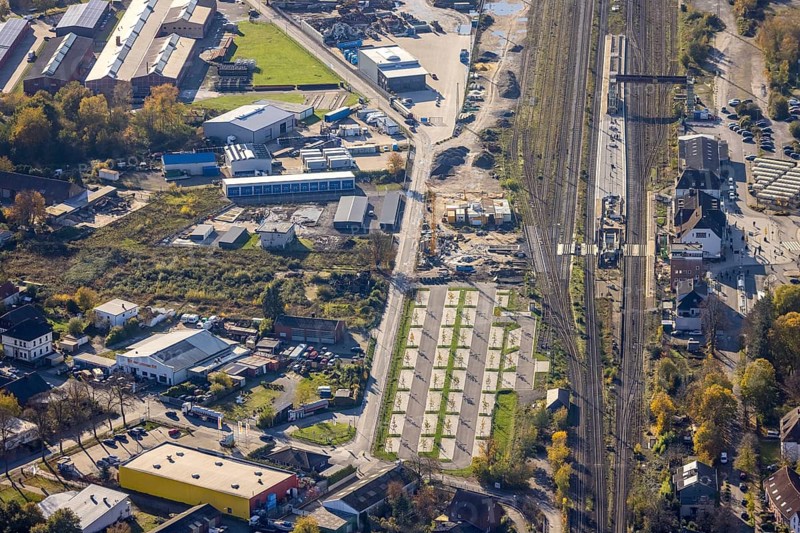 Aerial view, Haltern station, construction site conversion to a barrier-free station, Haltern town, Haltern am See, Ruhr area, North Rhine-Westphalia, Germany, railway tracks, station, station car park, construction work, construction area, building site, building plots, construction project, construction site, DE, Deutsche Bahn AG, through station, Europe, main station, central station, aerial view, aerial photography, aerial photography, overview, conversion work, bird's eye view, birds-eyes view, overview, autumn, autumn leaves, golden October, autumnal, Park & Ride car park, Park and Ride