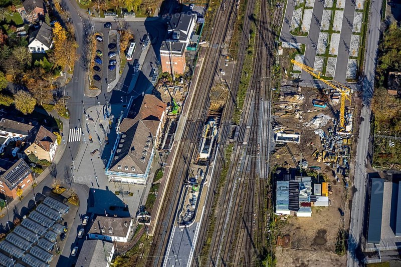 Aerial view, Haltern station, construction site conversion to a barrier-free station, Haltern town, Haltern am See, Ruhr area, North Rhine-Westphalia, Germany, railway tracks, station, station car park, construction work, construction area, building site, building plots, construction project, construction project, construction site, DE, Deutsche Bahn AG, through station, Europe, central station, main station, aerial view, aerial photography, aerial photography, overview, reconstruction work, bird's-eye view, overview, autumn, autumn leaves, golden October, autumnal