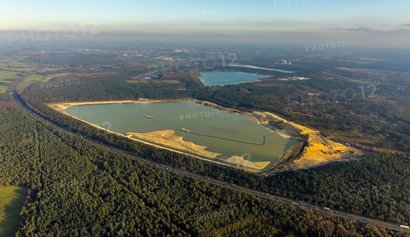 Aerial view of the Silbersee with quartz sand extraction in a forest area in the district Lehmbraken in Haltern am See in the Ruhr area in North Rhine-Westphalia, Germany, motorway A43, bathing lake, DE, Europe, Haltern am See, aerial view, aerial photography, aerial photograph, aerial photography, North Rhine-Westphalia, quartz sand extraction, Ruhr area, lake, overview, bird's eye view, forest area, birds-eyes view, overview