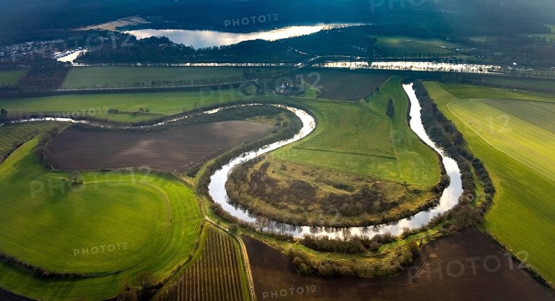 HALTERN AM SEE 16.12.2020 Curved meander - loop of the riparian zones on the course of the river Lippe - in Haltern am See in the Ruhr area in the state of North Rhine-Westphalia, Germany // Curved loop of the riparian zones on the course of the river Lippe - in Haltern am See in the state North Rhine-Westphalia, Germany. Photo: Hans Blossey, aerial photograph, aerial photography, aerial photography, aerial photo, aerophoto, aerial photograph, aerial picture, Europe, Germany, North Rhine-Westphalia, Haltern am See, infrastructure, water, river, bank, course, waterway, shipping, navigation, bend, current, connection, level, curve, bend, round, radius, loop, rounding, circle, river loop, meander, // aerial photo, aerial photography, aerial picture, aerial view, air photo, Europe, North Rhine-Westphalia, Infrastructure, water, river, bank, course, waterway, navigation, shipping, bend, flow, connection, level, curve, round, loop, circle
