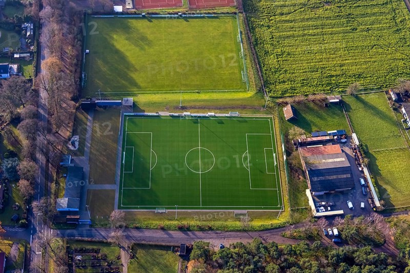 Aerial view of the football ground ofDJK Blau-Weiß Lavesum 1931 and tennis court in the district Lavesum in Haltern am See in the Ruhr area in North Rhine-Westphalia, Germany, Am cemetery, DE, Europe, football ground, football stadium, football club, Haltern am See, aerial view, aerial photograph, aerial photography, aerial photography, North Rhine-Westphalia, Ruhr area, sports, sports facilities, sports field, sports facility, stadium, tennis, tennis facility, tennis courts, overview, bird's-eye view, birds-eyes view, overview