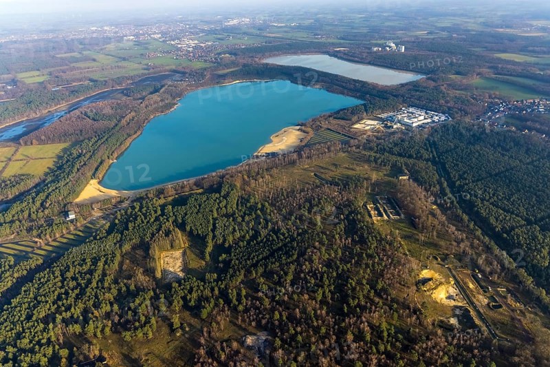 Aerial view of Silbersee II and Silbersee II in the forest area with KSPE Kalksandstein-Planelemente Verwaltungsgesellschaft mbH for quartz sand extraction in the district of Lehmbraken in Haltern am See in the Ruhr area in North Rhine-Westphalia, Germany, bathing lake, DE, Europe, commercial enterprises, commercial area, industrial estate, commercial park, commercial site, commercial use, Haltern am See, industrial area, industrial building, industrial site, aerial view, aerial photograph, aerial photography, aerial photography, North Rhine-Westphalia, quartz sand extraction, Ruhr area, lake, overview, bird's-eye view, forest area, birds-eyes view, overview