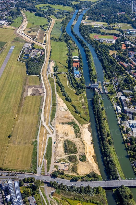 Aerial view, construction site Erlebensraum Lippeaue, Datteln-Hamm canal, sports fields of the HTC hockey and tennis club, EDLH airfield, Hamm, Alleecenter shopping centre, Hamm, Ruhr area, North Rhine-Westphalia, Germany