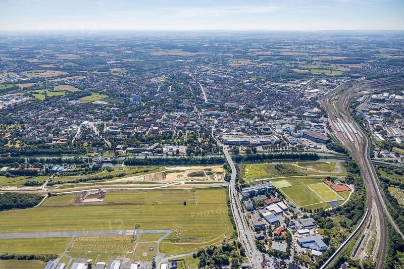 Aerial view, construction site Erlebensraum Lippeaue, Datteln-Hamm-Canal, Hammer Technologie- und Gründerzentrum Hamtec, sports fields of HTC Hockey- und Tennisclub, airfield EDLH, Hamm, shopping centre Alleecenter, Ruhr area, North Rhine-Westphalia, Germany, DE, Europe, birds-eyes, view, aerial view, aerial photography, aerial photography, overview, overview, bird's-eye view, Lippe, Hamm-Datteln-Kanal, shopping, food, clothing, consumption, consumer, technology centre, technology, company, development, waterway, shipping, transport, logistics, goods movement, ships, waters, goods, shopping, textiles, airfield, flying, air sports, leisure, pilot