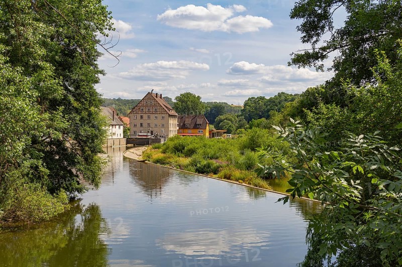 Riparian impression of Berlichingen at river Jagst in southern Germany at summer time