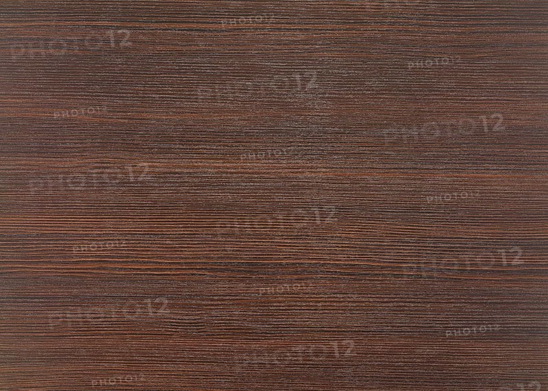 A full frame dark brown wood grain surface