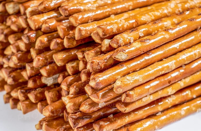 Closeup of some stacked salt sticks in light back