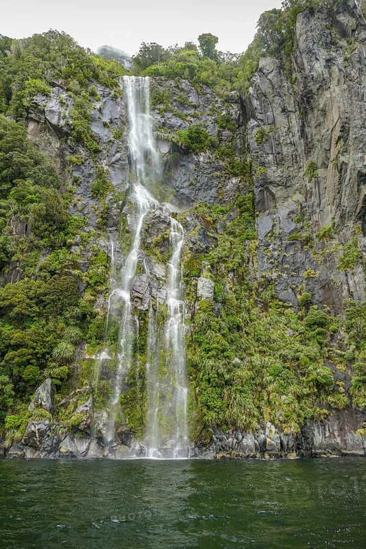 Waterfall around Milford Sound at the South Island of New Zealand