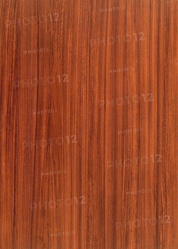 A full frame red brown wood grain surface