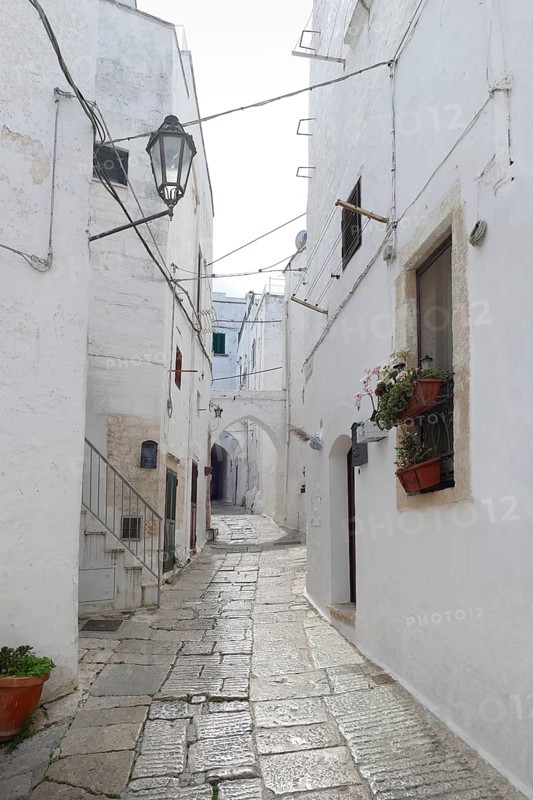Alleyway in Ostuni, a city in Apulia, Italy