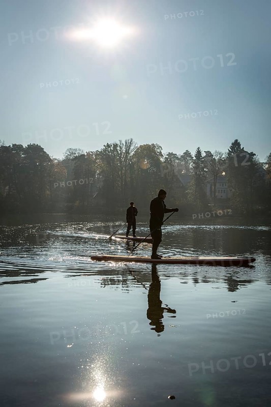 DEU Germany Germany Berlin Standup paddler (SUP) on the Krumme Lanke