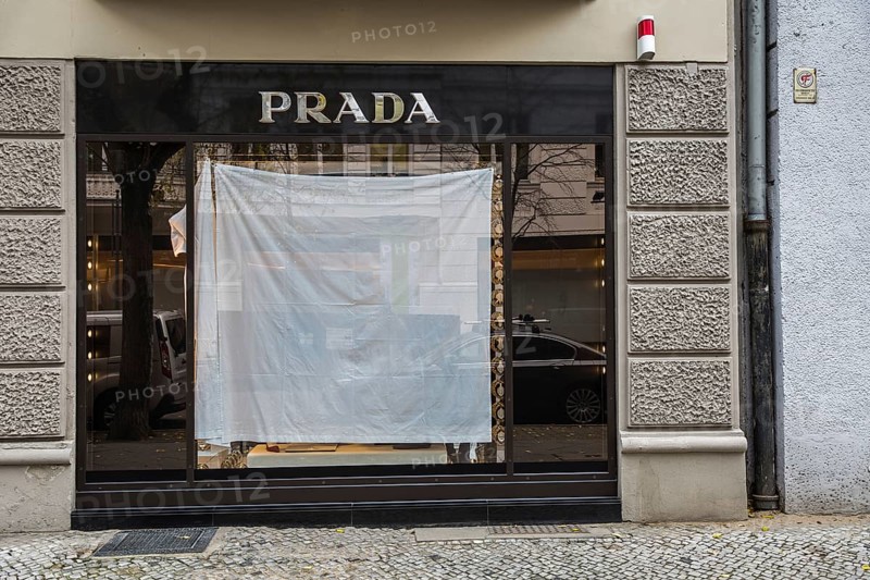 DEU Germany Germany Berlin A shop window of the luxury fashion company Prada is covered with a white sheet during a remodelling project