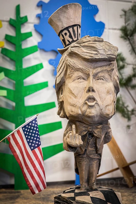 DEU Germany Germany Berlin The bust of US President Donald Trump, made by a chainsaw artist, at the Green Week