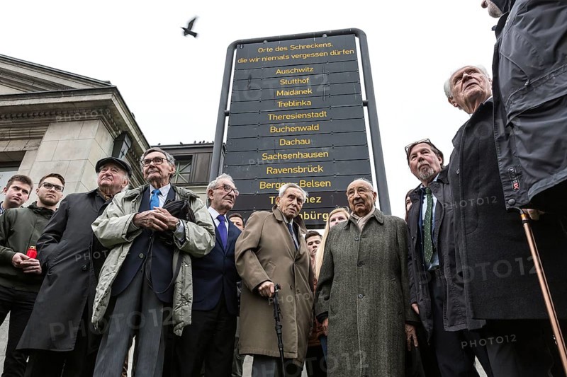 DEU Germany Germany Berlin Former Jewish concentration camp inmates join Polish schoolchildren in commemorating Kristallnacht with a wreath-laying ceremony at Wittenbergplatz