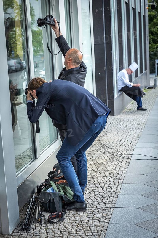 DEU Germany Germany Berlin AFD press conference on immigration and crime with Alice Weidel and Alexander Gauland. Photographers try to get a picture from outside
