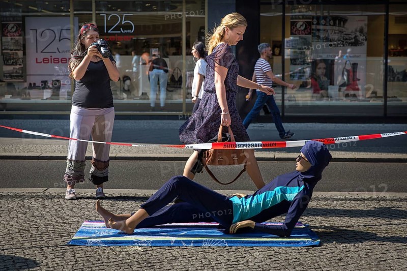 DEU Germany Germany Berlin A doll wearing a burkini lies at the entrance to the Französische Straße underground station on Friedrichsstrasse in Berlin-Mitte