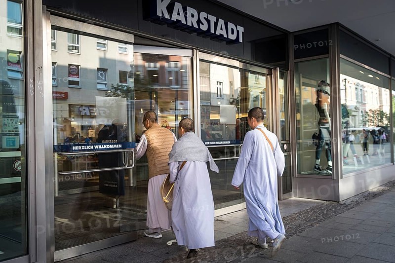 DEU Germany Germany Berlin Asians in the centre of Berlin-Spandau on their way to the Karstadt department stores'