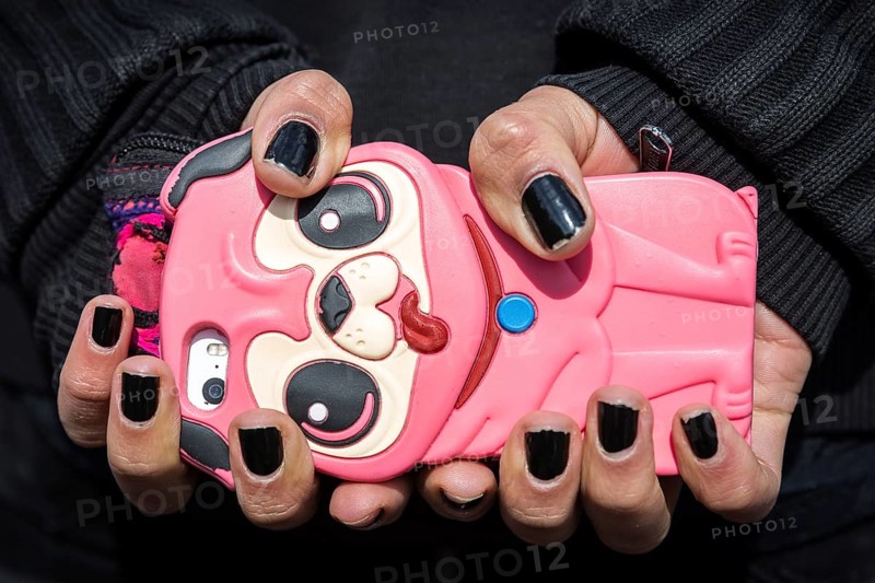 DEU Germany Germany Berlin The new home of the makers of Bar 25 and Kater Holzig at Holzmarkt 25. mobile phones and black fingernails
