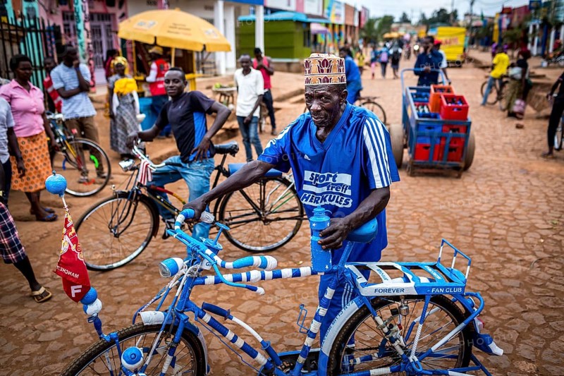 RWA RWANDA Rwanda Kayonza A cyclist with a decorated bicycle poses for a photo