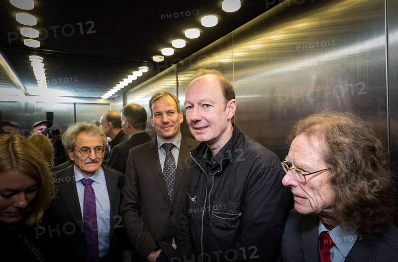 DEU Germany Germany Berlin Trial against Die Partei begins at the Berlin Administrative Court. The German Bundestag is demanding the return of subsidies that the satirists' party had received from the federal government through the 'Buy Money' campaign. In the lift from left: lawyers Morlock and Rosener, Martin Sonneborn and treasurer Norbert Gravius