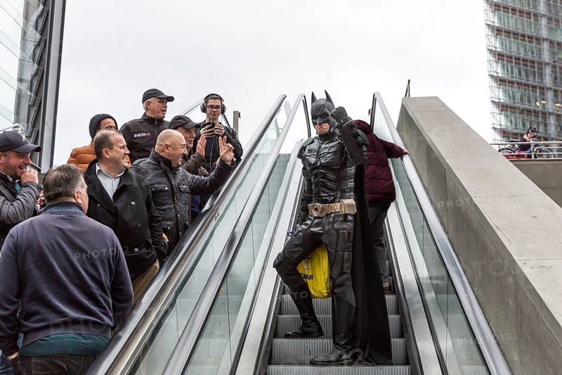 DEU Germany Germany Berlin A man wearing a Batman costume walks across Potsdamer Platz