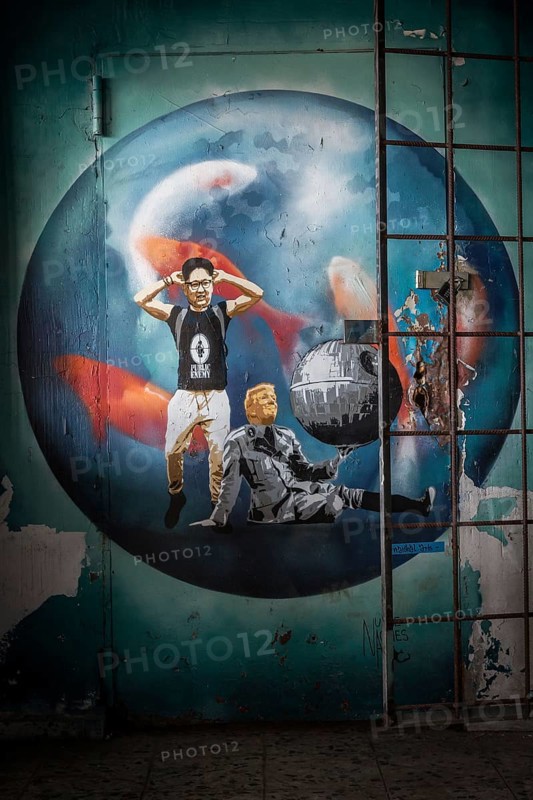DEU Germany Germany Berlin A graffiti shows U.S. President Donald Trump and North Korean dictator Kim Jong Un in a ridiculous pose. A mural on the site of the former American surveillance station on the Teufelsberg