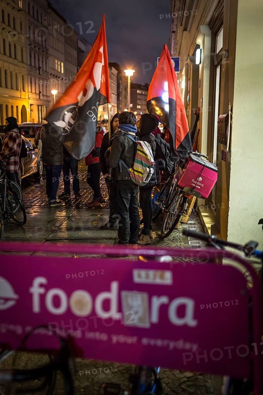 DEU Germany Germany Berlin Foodora bike couriers protest against poor working conditions and unequal pay in front of their distribution centre (hub) in Ackerstraße
